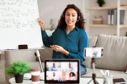 Preview: Enthusiastic Woman Teaching Math Online at Home