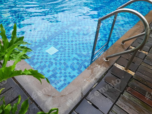 Preview: Corner of swimming pool with stair and wooden deck