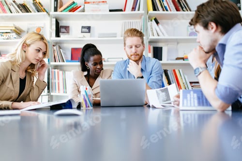 Preview: Business people collaborating in office and working on project together
