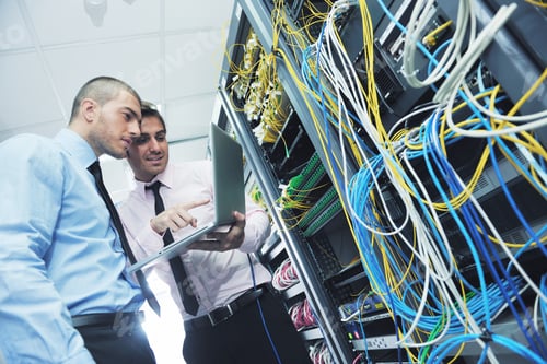 Preview: Group Of Young Business People It Engineer In Network Server Room Solving Problems And Give Help