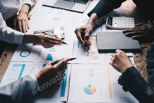 Preview: Business People Meeting to analyse and discuss and brainstorming the financial report chart data in