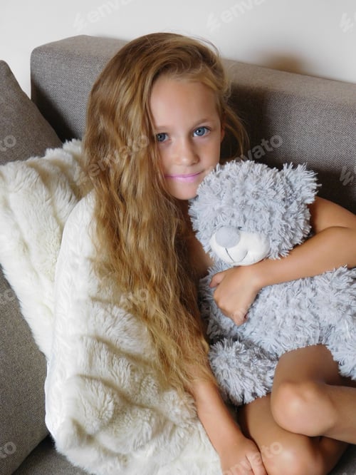 Preview: Little girl and teddybear