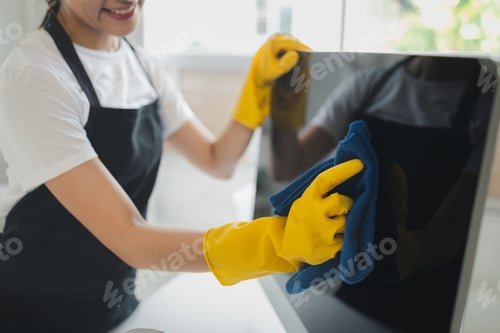 Preview: Asian female cleaner, Wear rubber gloves and an apron and work with a happy smile, Cleaning staff wi