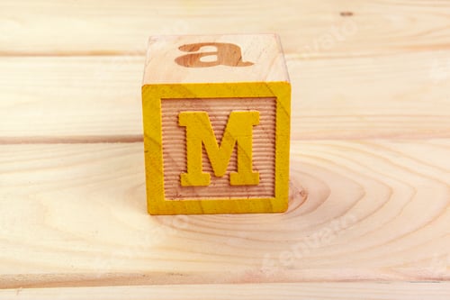 Preview: wooden block alphabet lay on wooden floor