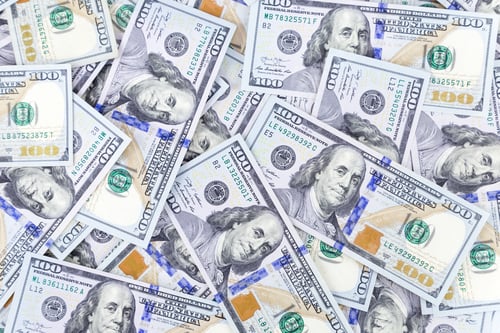 Preview: top view of dollars scattered on the desk, nobody, no people