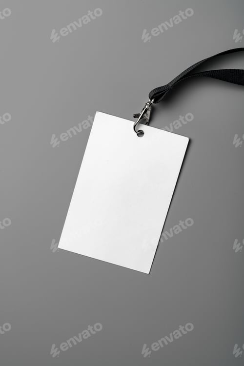 Preview: Blank nametag on gray background copy space