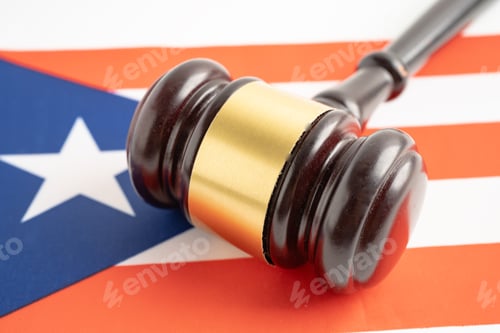 Preview: Puerto rico for judge lawyer and US dollar banknotes on USA America flag, finance concept.