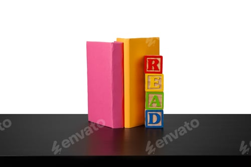 Preview: Stack of books on wooden table against white background