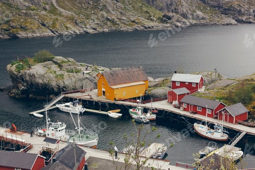 Preview: Nusfjord, Norway - May 28, 2015: Aerial view of small fishing village.