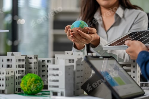 Preview: Engineer Teamwork Meeting, with partner on model building at company office working