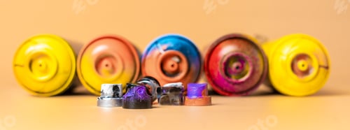 Preview: several used spray caps or dispensers b