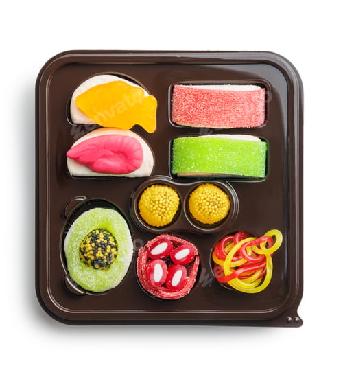 Vista previa: Set de dulces caramelos de sushi aislados sobre fondo blanco.