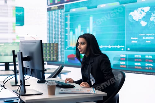 Preview: Business specialist reviewing key performance indicators within the firm