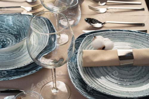 Preview: Table setting with stylish dishware on beige tablecloth
