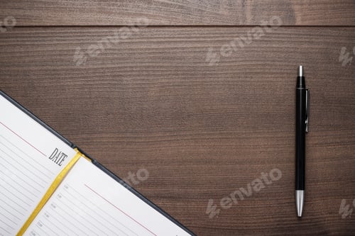 Preview: Opened Notebook And Pen On Wooden Table