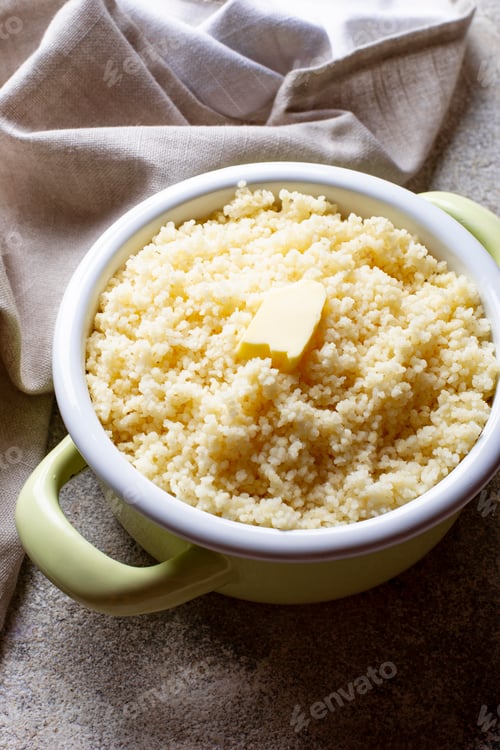 Preview: Couscous with butter in pot