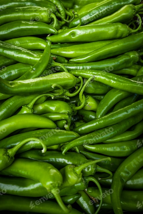 Preview: Raw Green Organic Serrano Peppers. green chili peppers
