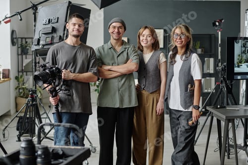 Preview: Portrait of Smiling Crew at Studio