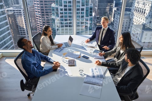 Preview: Happy busy international professional business team at group meeting.