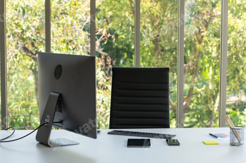 Preview: A large office with a computer of CEO and nature background