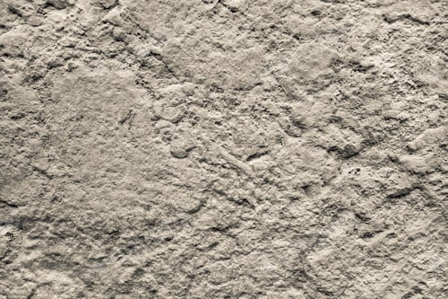 Preview: Bumpy Texture Of A Concrete Or Stone Surface Of Beige Color For Abstract Background And For