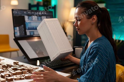 Preview: Future engineering architect analyzing maquette model