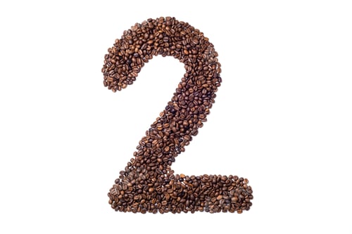 Preview: Number made with coffee beans on white background. Number 2 two made of coffee