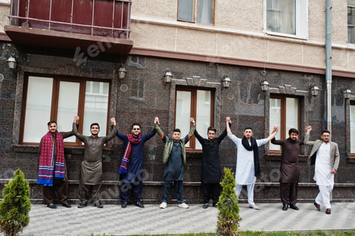 Preview: Group of pakistani man wearing traditional clothes salwar kameez or kurta.