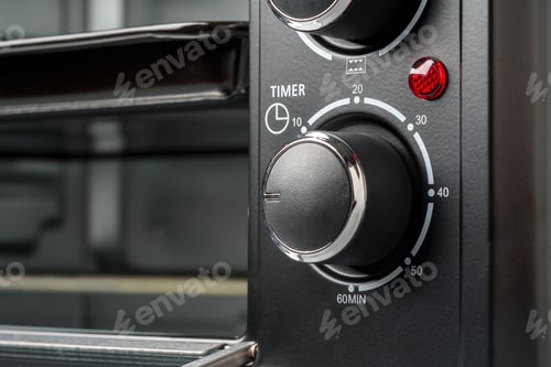 Preview: Close up of black mini electric oven home appliance
