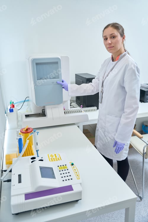 Preview: Health worker turns on the hematology analyzer