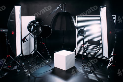 Preview: Modern photo studio with professional equipment. Black cyclorama.