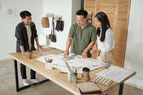 Preview: Three confident architects choosing color from palette