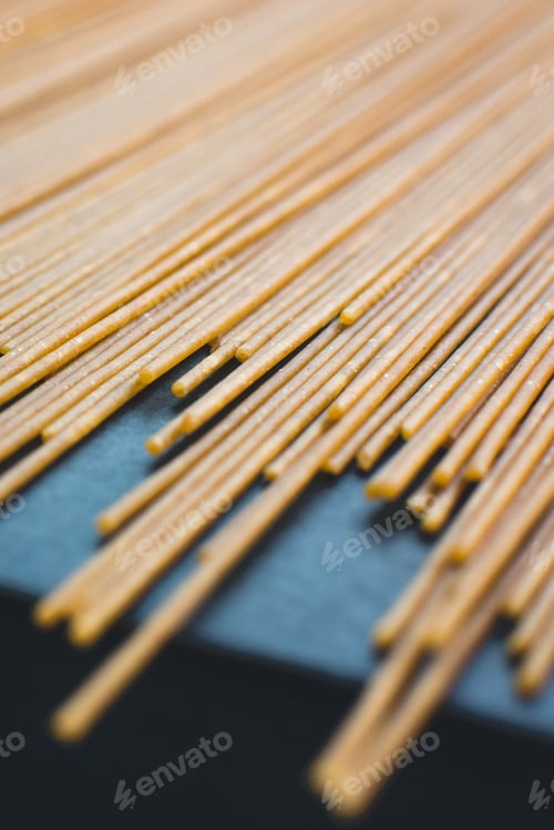 Preview: Detail of pasta spaghetti on a black background
