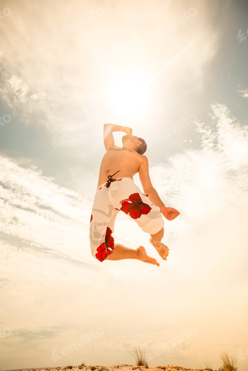 Preview: male beach volleyball game player jump on hot sand