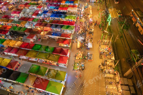Preview: Aerial top view of Night Market people walking street, Colorful tents. Retail shops