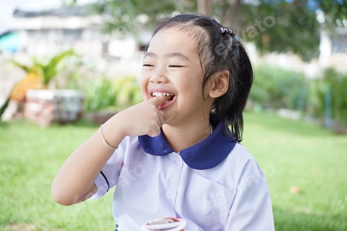 Preview: Little girl in school shirt
