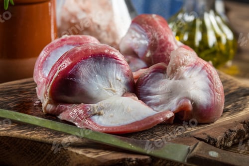 Preview: Raw uncooked turkey gizzards.