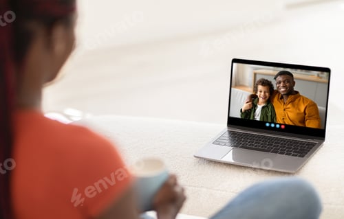 Preview: A joyful video call between a mother and her child at home in the afternoon