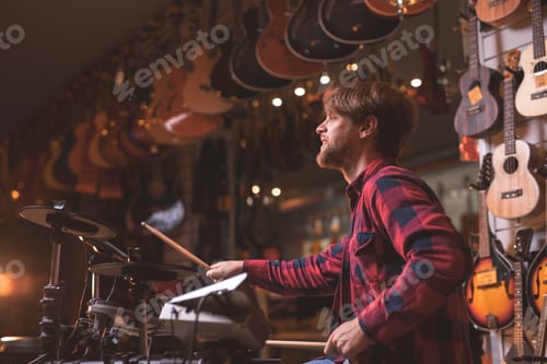 Preview: Musician Playing Drums in a Music Store