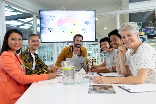 Preview: Front view of diverse business people discussing in the meeting at conference room in office