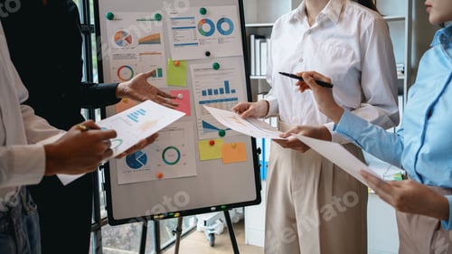 Preview: Meeting of hardworking businesspeople work together as a team by presenting graphs. and charting
