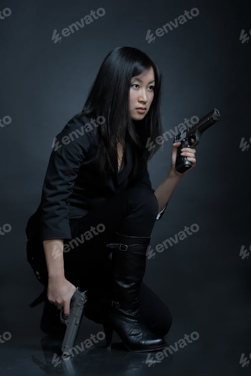 Preview: Asian Woman With A Pistol