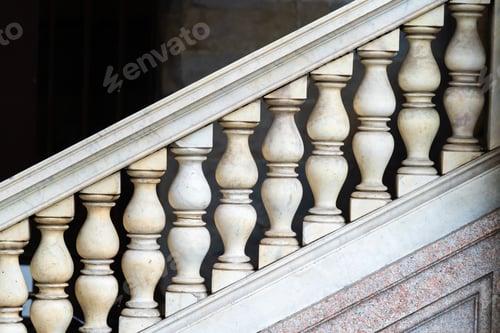 Preview: closeup of ornate stone staircase balusters