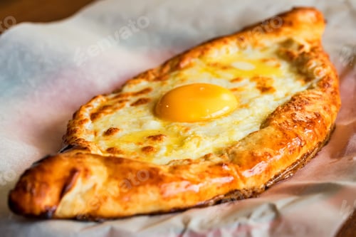 Preview: Ajarian khachapuri Georgian cheese pie with egg close