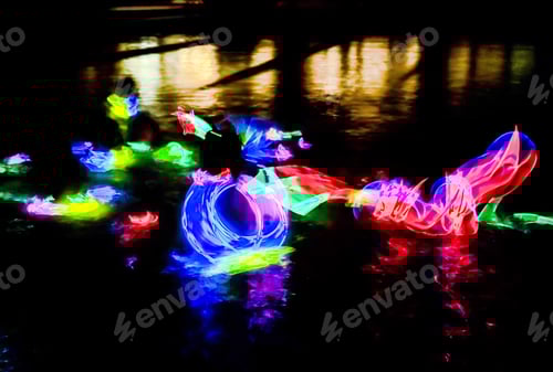 Preview: Motion blur of neon lights on water