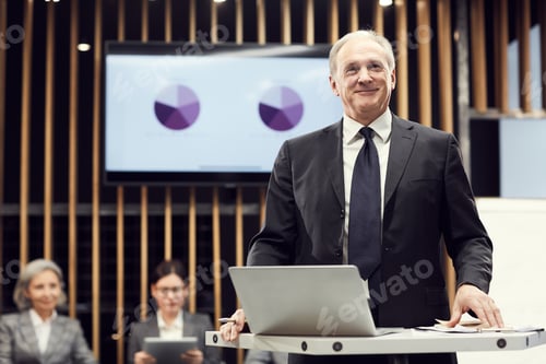 Preview: Satisfied senior business speaker