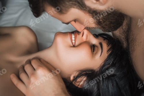 Preview: A couple in love makes love in bed. Guy and girl kissing. Loving couple having sex