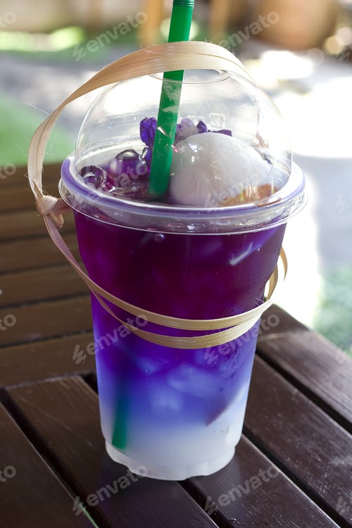 Preview: Butterfly Pea Juice Blend Ice in Plastic Glass