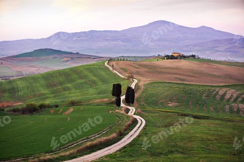Preview: Landscape of hills covered in farm fields in Tuscany, Italy