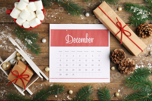 Preview: Flat lay composition with paper calendar on wooden table